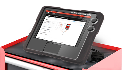 Diagnostic tool resting on a workshop trolley with HynesPro data