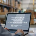 Ordinateur portable posé sur un bureau qui affiche sur son écran la mention "Intégration native de la facturation électronique à l'ensemble des ERP et DMS" Infopro Digital Automotive