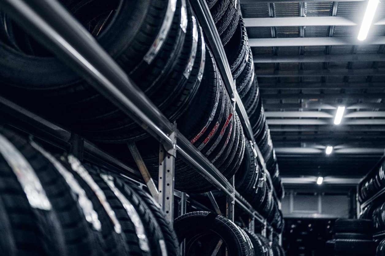 Shelves with tyres to represent technical tyre fitting data