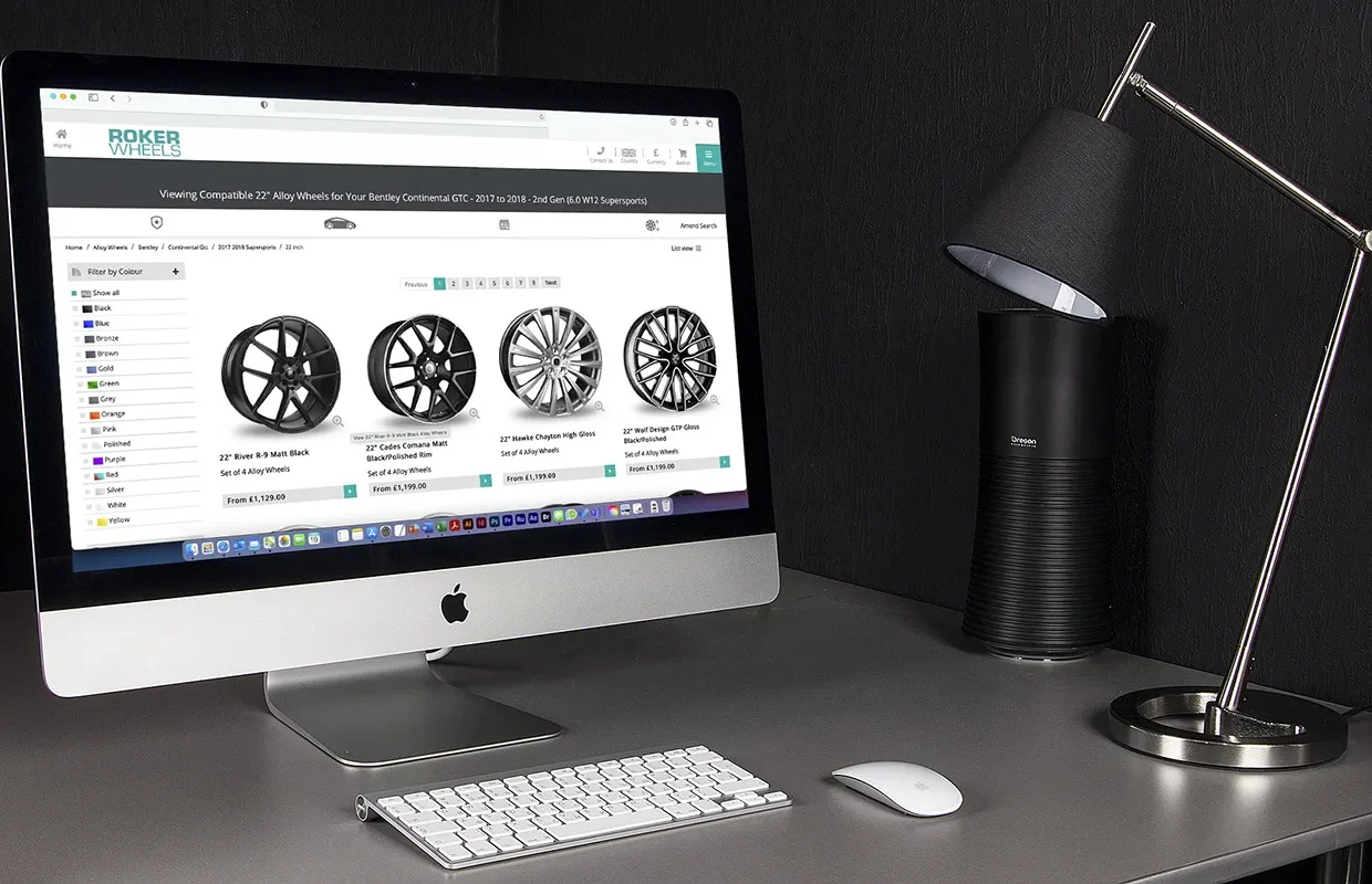 The computer shows a screen of DriveRightData Wheel Fitment, Product & Technical Data Services