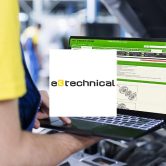 Mechanic using e3technical software on a laptop for vehicle diagnostics and repair data
