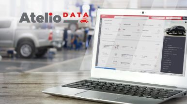 Computer displaying Atelio Data in a garage setting, enhancing workshop efficiency