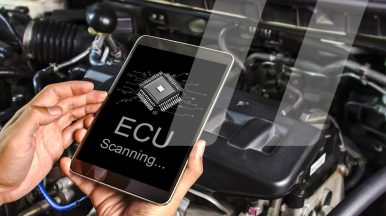 Car repairman using the passthru protocol for vehicle diagnostics in modern garages